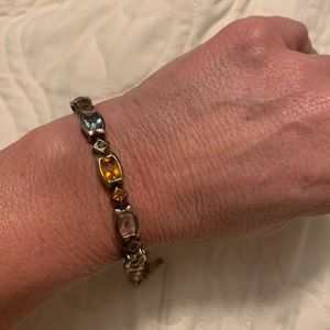 Multi colored stone bracelet. 7”. Gold plated.